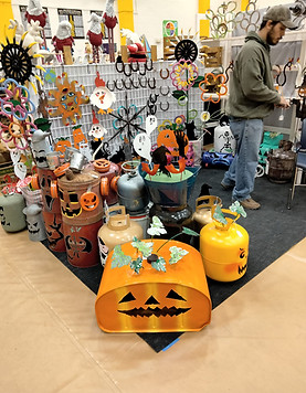 Halloween-themed metal crafts vendor booth