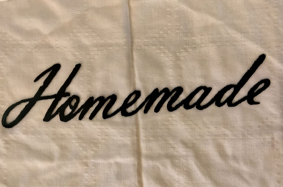 Homemade text on white fabric