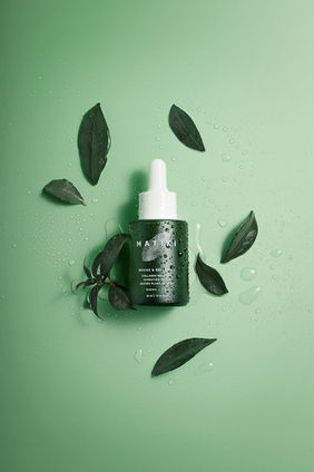 Example of product photography created by Karolina Ferbei Photography for beauty brand using natural props and light green background