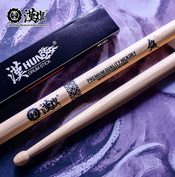 钱豪签名鼓棒与包装艺术照