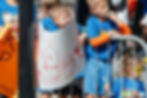 Children with a Dad sign at the New Haven Road Race