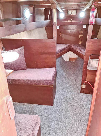 A room with a couple of beds