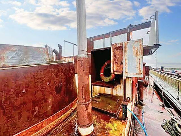 A metal boat with a tube