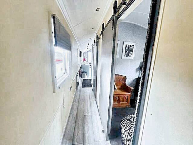 A hallway with sliding doors