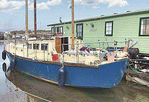 A boat tied to a dock
