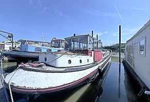 A boat docked at a dock.