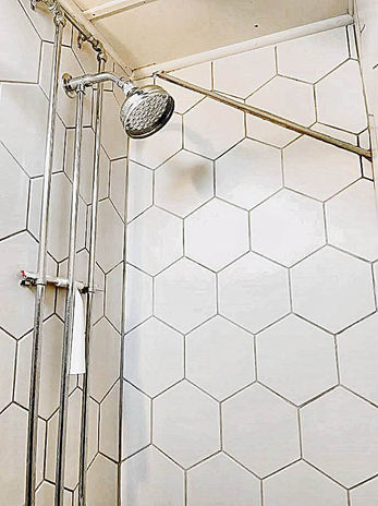 A shower head in a bathroom