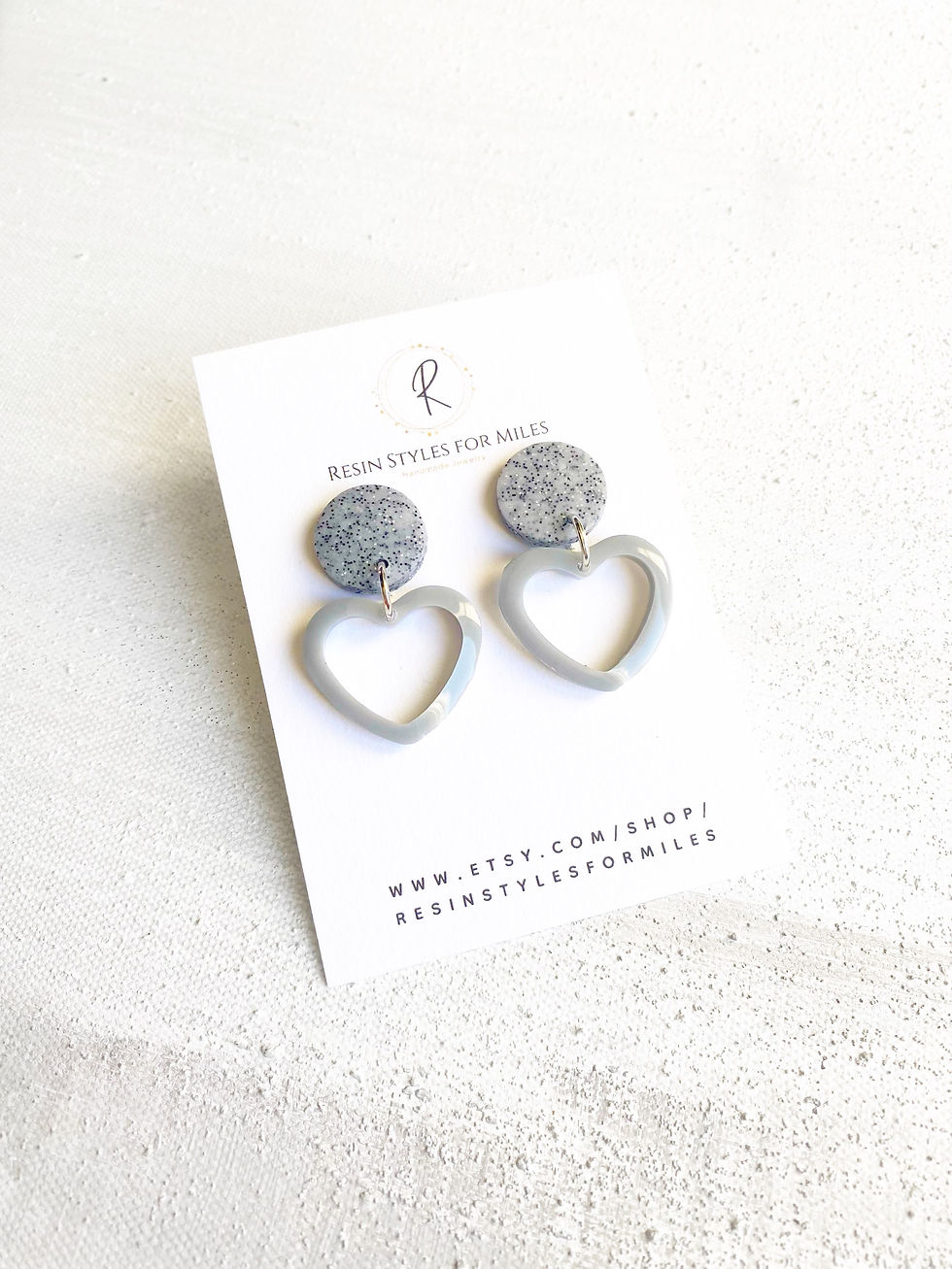 Grey open heart resin earrings