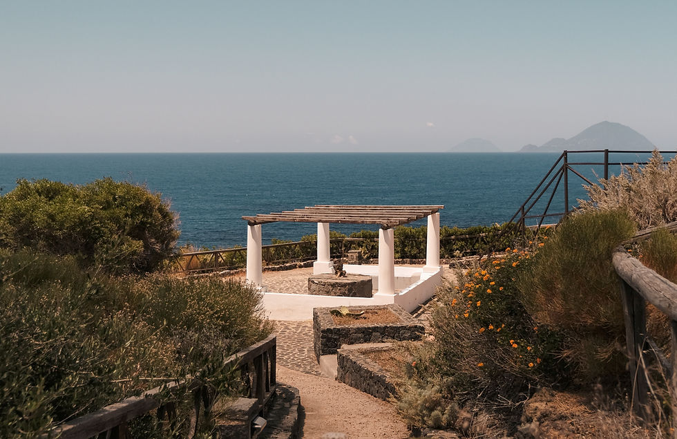 Small white gazebo overlooking the blue Mediterranean Sea