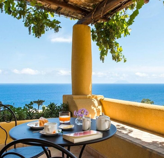 Terrace breakfast overlooking the Mediterranean sea.