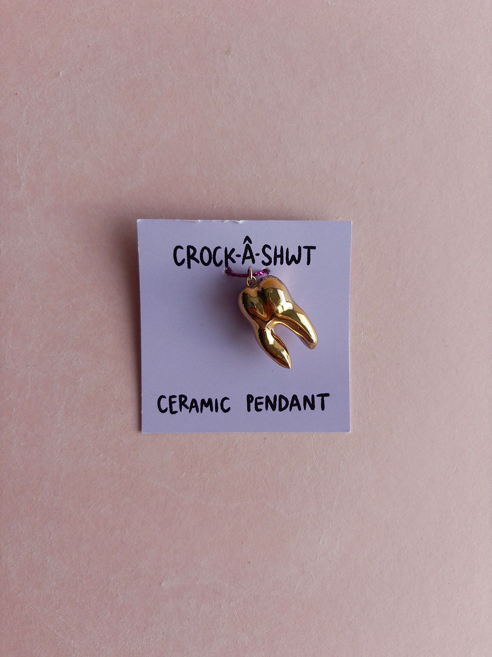Thumbnail: Tooth Pendant