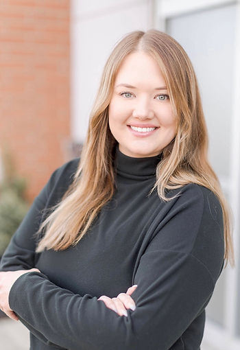 Headshot of Curated Hair Studio owner Amber Moore.