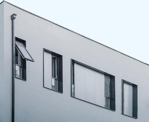 Black farmed top hung hinged windows manufactured and installed by Aluminium Windows Cape Town