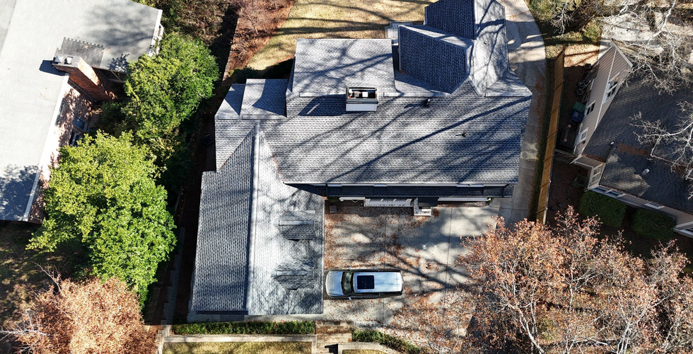 Newly installed shingle roof replacement completed by roofing contractor in Atlanta offering roof repairs and inspections