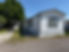 Adorable 2-bedroom/2-bath home feels much larger than you might expect, with a vaulted ceiling and a large living room and kitchen with a small island and plenty of cabinet and counter space. The bedrooms are split, with the primary complete with a walk-in closet and a full ensuite. The exterior has been freshly painted, and a new electrical panel has been installed. This one is a must-see. Located in Target Range Mobile Home Community, just minutes from multiple outdoor activities, medical facilities, and shopping. Lot rent includes water, sewer, and garbage. Dogs are allowed with approval. Current lot rent is $725.00