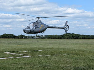 Helicopter hovering over H