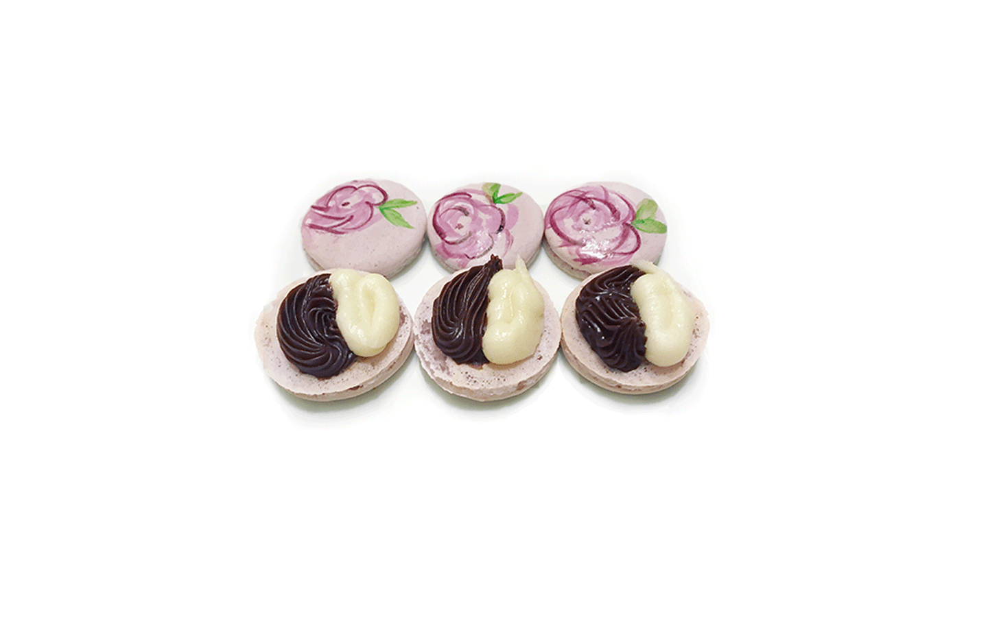 three  lavender macaron with chocolate and vanilla filling showing, purple painted flowers on top