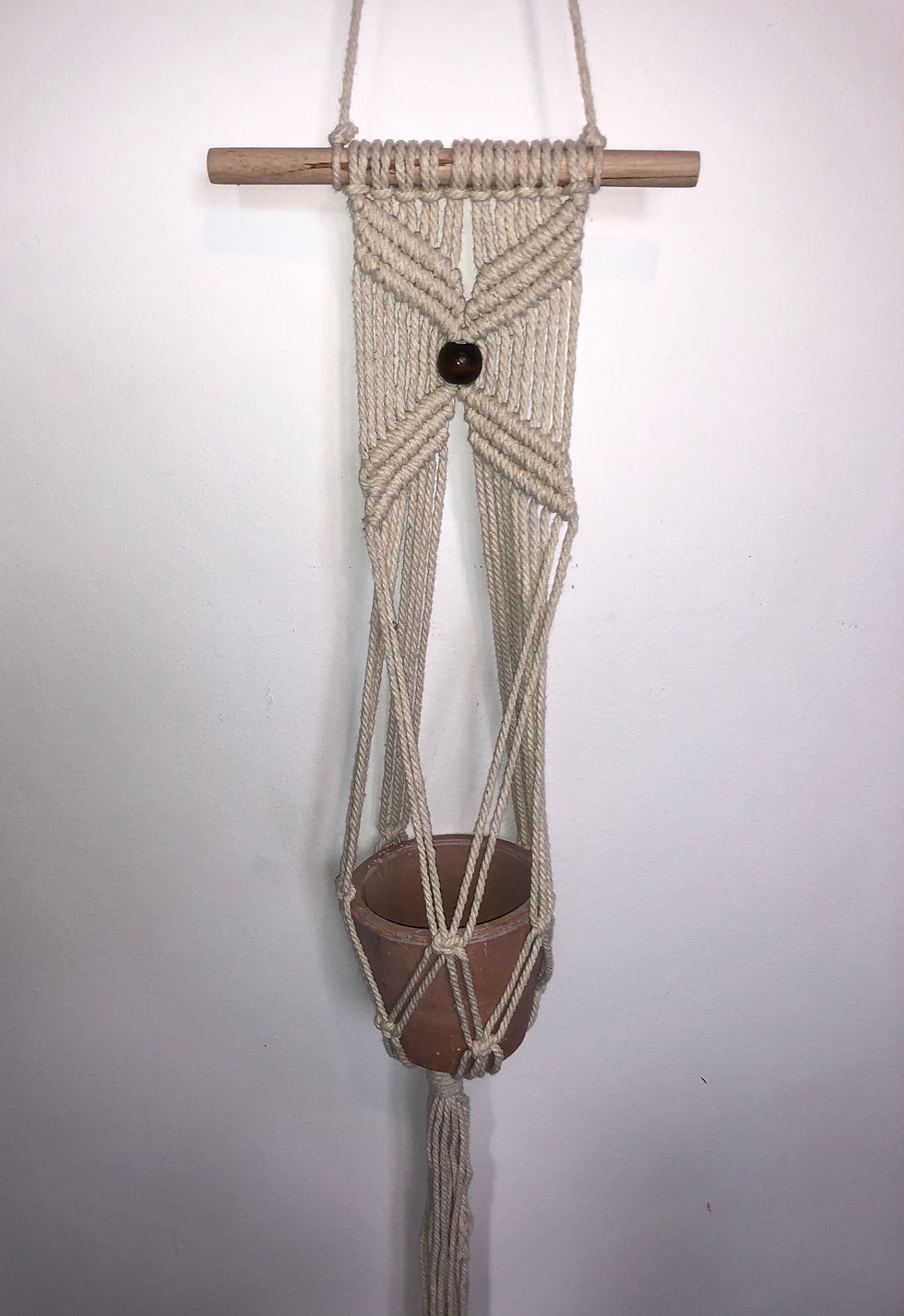 Hanging macrame pot for sale at paisleyflamingo