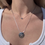 Thumbnail: White Gold Sand Dollar Necklace