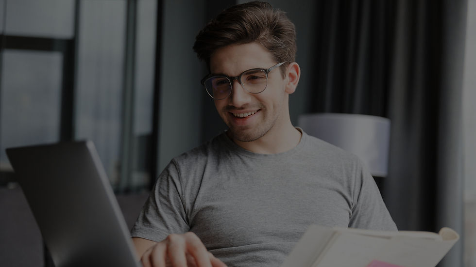 Man researching real estate project on his laptop