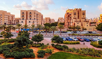 Aerial view of Remraam low-rise apartment community in Dubailand – area guide