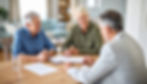 expat couple reviewing their pensions with a qualified financial advisor