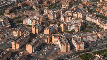 Aerial view of International City apartment clusters and Dragon Mart in Dubai – area guide