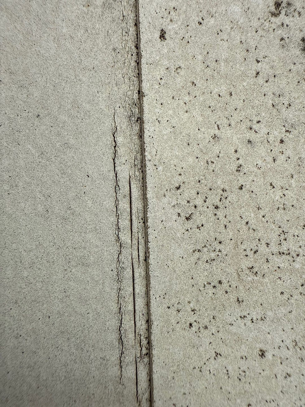 “Cracked TPO seam illustrating membrane aging and potential leak points in Canton Texas.”