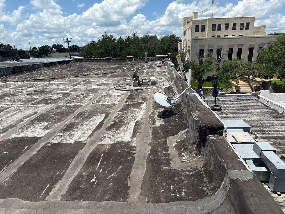 “Aging Mod-Bit commercial roof evaluated for TPO overlay versus restoration.”