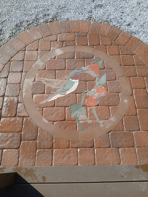 hummingbird paver inlay
patio design ideas