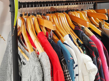 A clothing rail filled with clothes