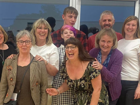 A group of volunteers and models from Hayley's CIC