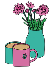 Two mugs of tea with a vase of flowers