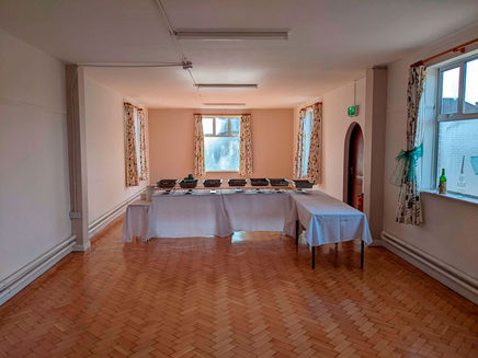 Photo of front of medium-sized events room in church