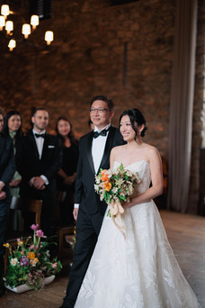 Julie walks down the aisle with her father