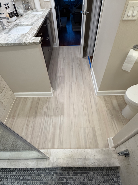 Luxury vinyl plank flooring installed in a home with a modern, clean finish.