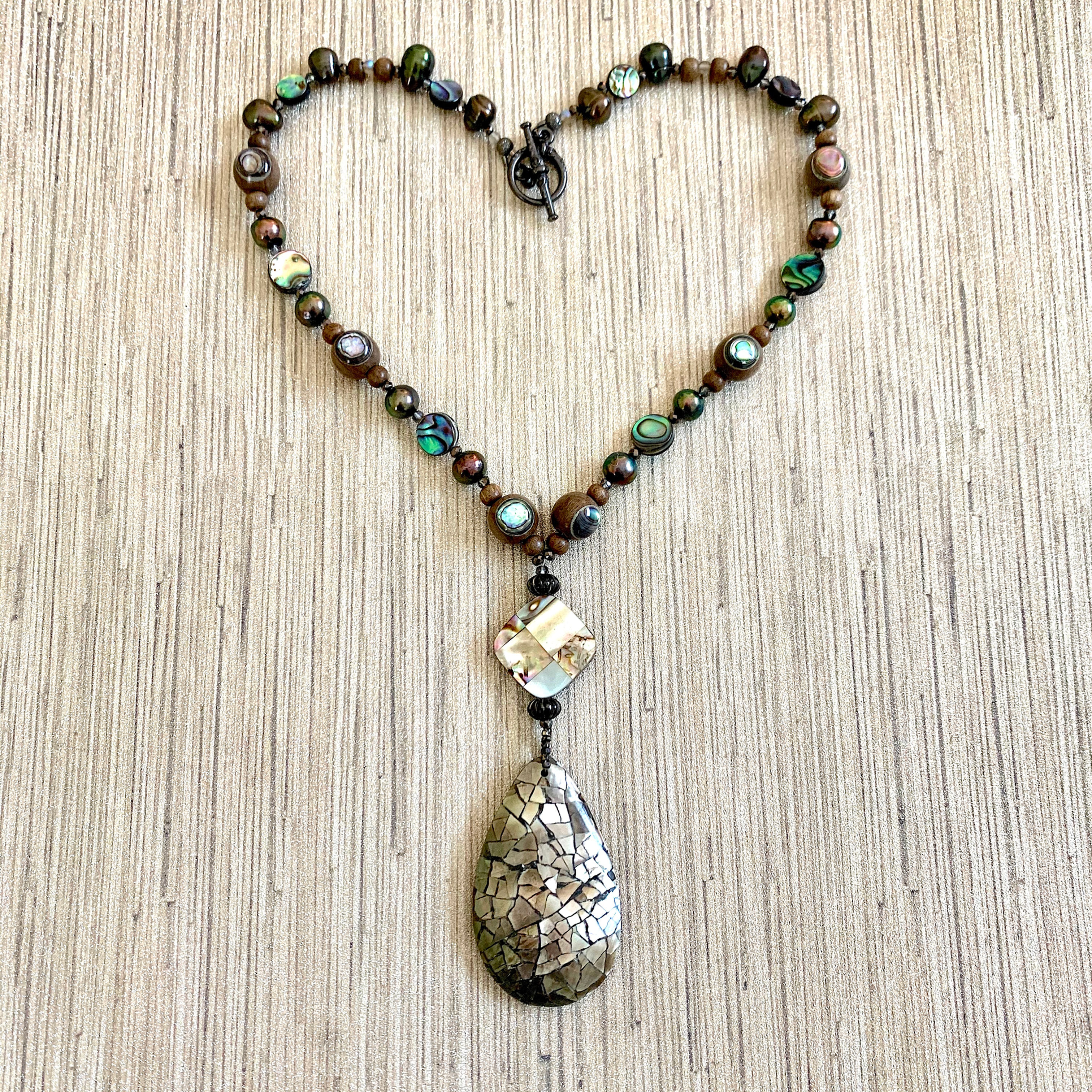 Taupe mother of pearl pendant abalone wood bead and pearl necklace