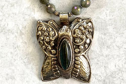 Tibetan silver repousse' pendant with labradorite stone and beads