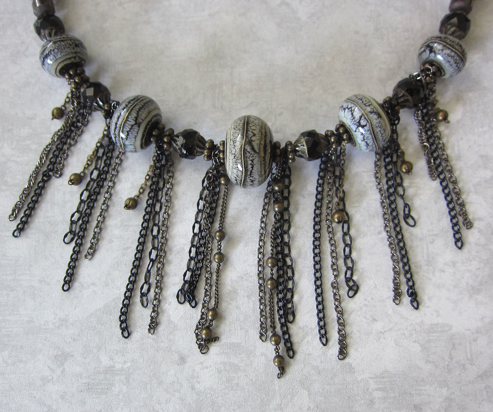 Thumbnail: Hand blown lamp work glass and mixed bead necklace with mixed chain fringes