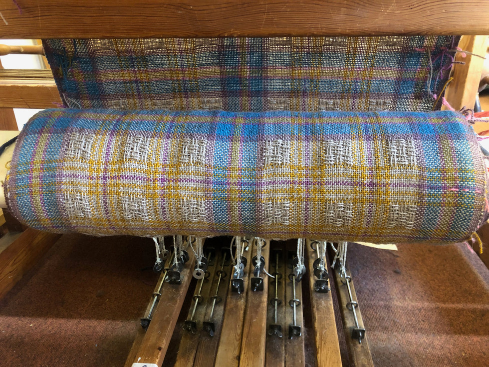 The cloth beam.