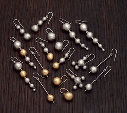 ball earrings on wood SL b