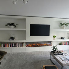 For 800cm wide by 240cm high with lower draws £8000.00  excluding the TV. Fire & Fitting.