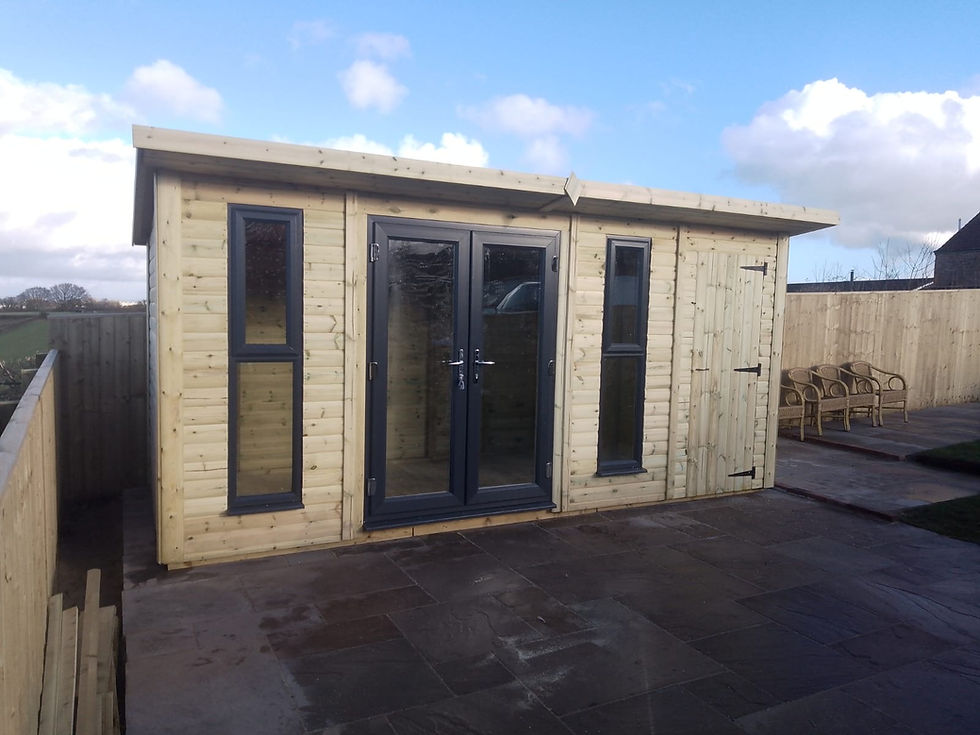 Eye-level view of a bespoke garden building with log lap pressure treated cladding in a lush backyard