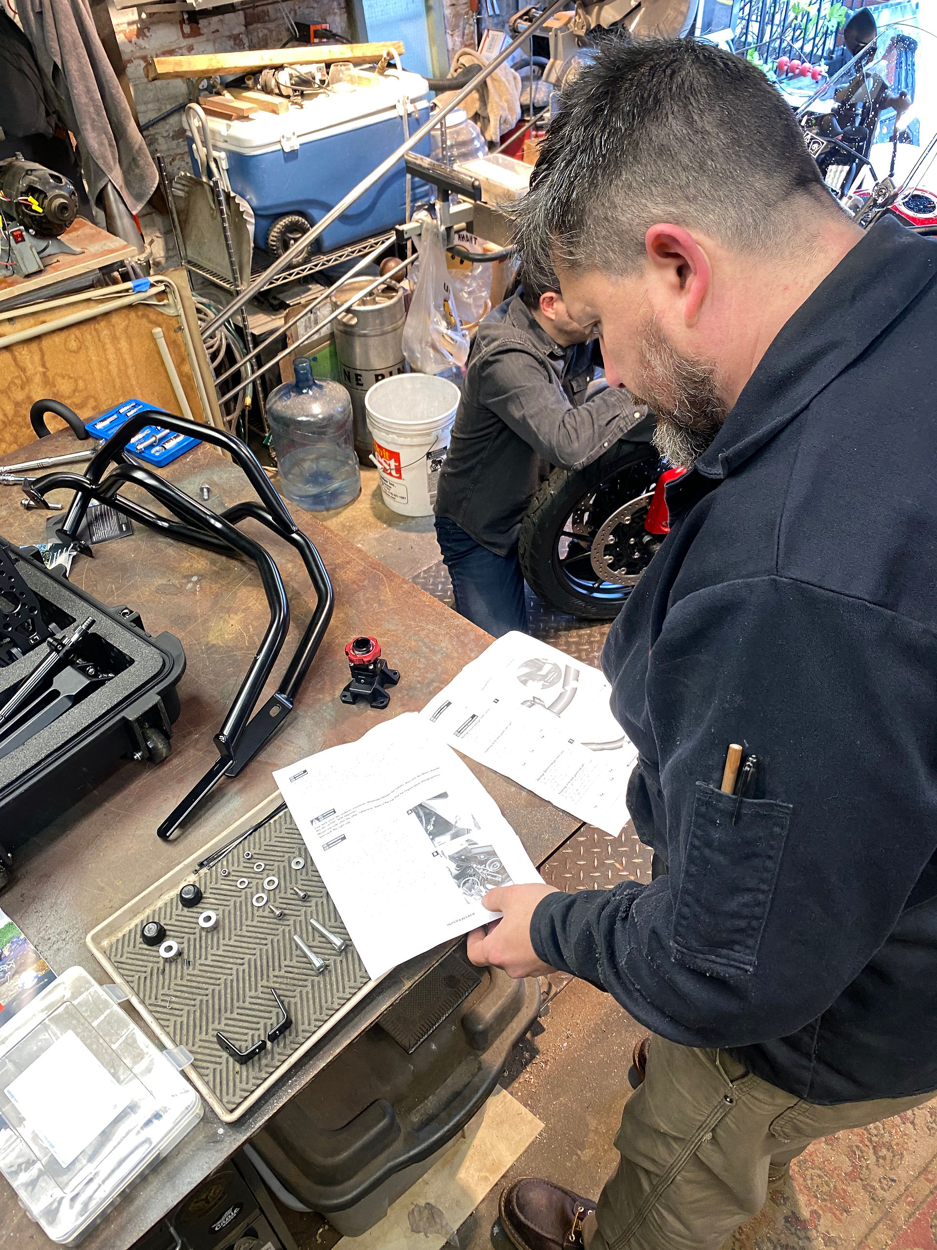 Man looking at instruction