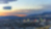 Spectacular sunset over Reno, Nevada, highlighting "Call The Clean Cut Movers" for seamless moving services.