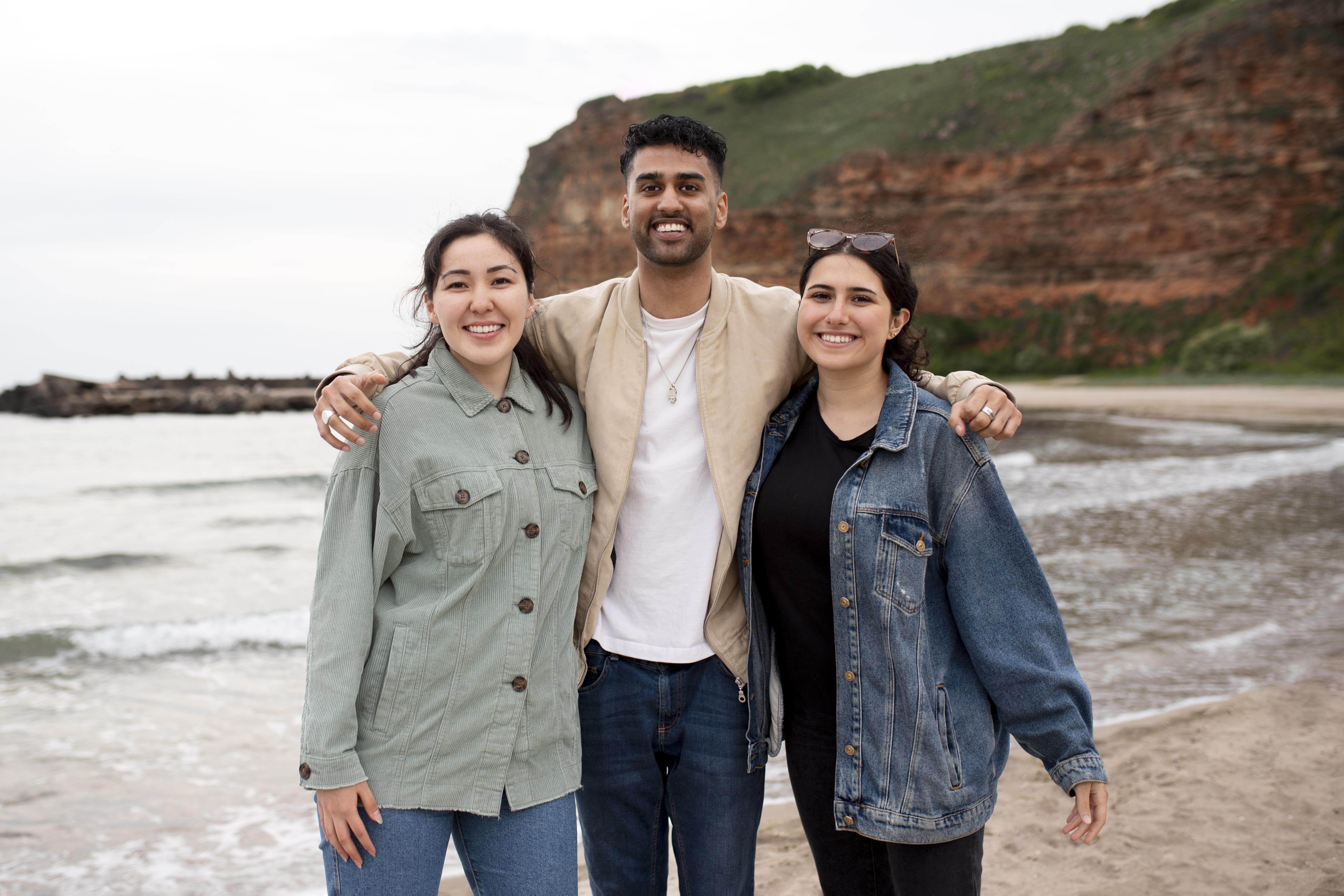 medium-shot-happy-people-seaside.jpg