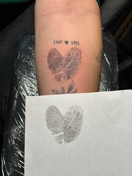 Thumb Print Tattoo
