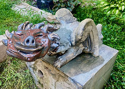 Gargoyle with restored red head.