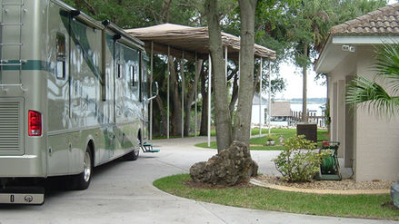 Touchless Cover in the up position for an RV
