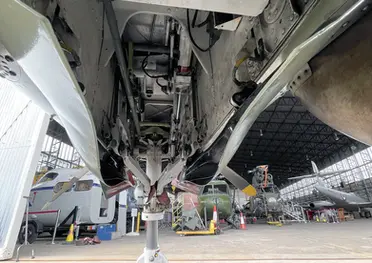 Looking up into front landing gear compartment on Tucano T.1 'Enniskillen' ZF378 at the Ulster Aviation Society